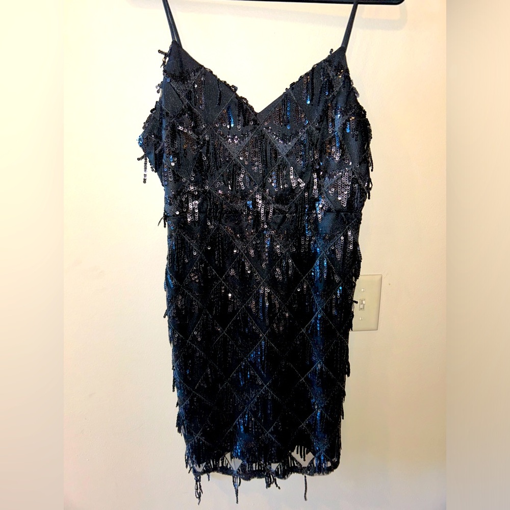 Black flapper dress with sequins. Never worn